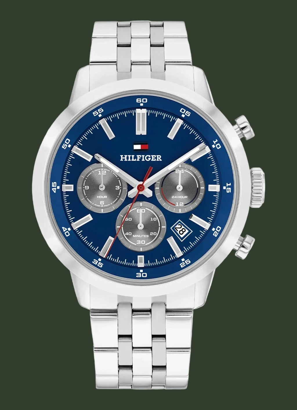 A Tommy Hilfiger men's chronograph watch with a silver stainless steel case and link bracelet, featuring a blue dial with silver subdials and markers.