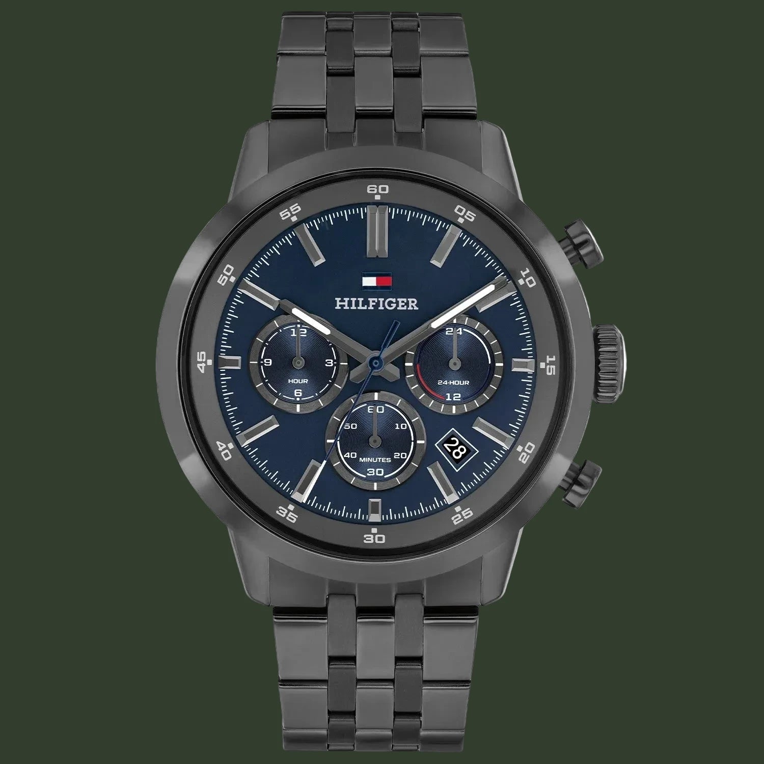 Tommy Hilfiger watch with dark blue face and black metal strap on a white background