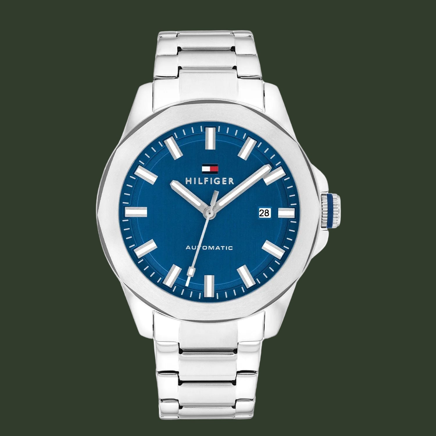 Tommy Hilfiger watch with blue dial and silver metal strap on a white background