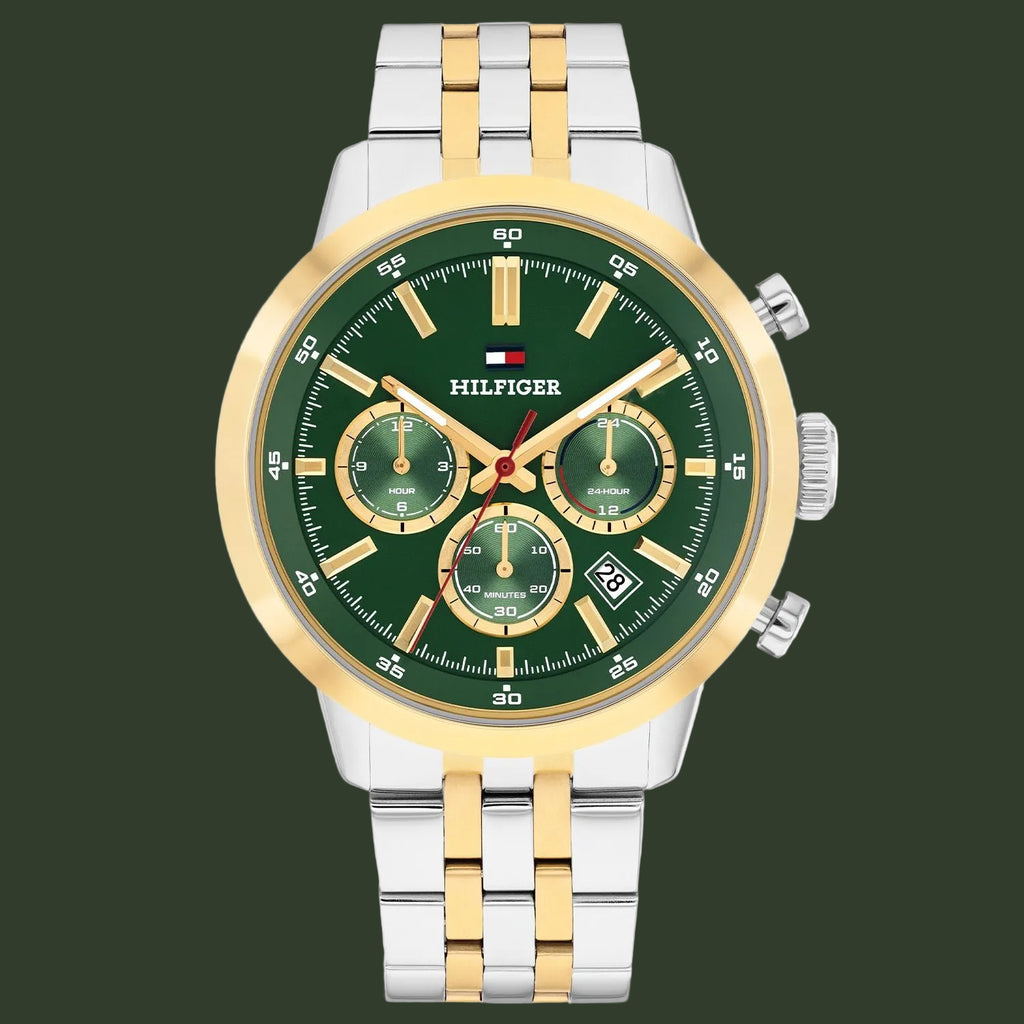 Tommy Hilfiger watch with green dial and two-tone metal strap on a white background
