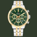 Tommy Hilfiger watch with green dial and two-tone metal strap on a white background