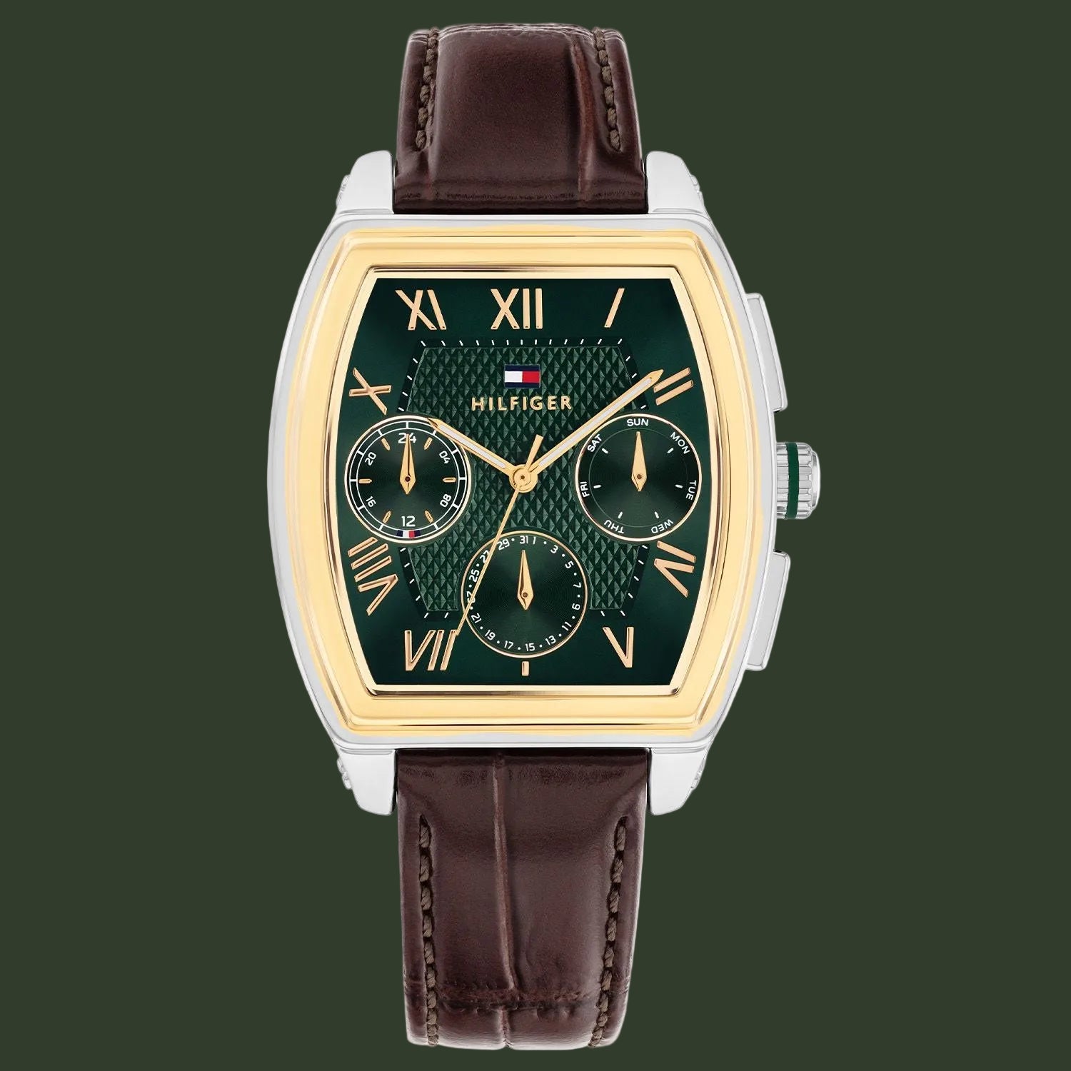 Tommy Hilfiger watch with green face and brown leather strap on white background