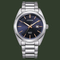 Citizen Quartz WR 50 watch with a silver stainless steel link bracelet, a blue sunburst dial, and rose gold-tone hands and hour markers.
