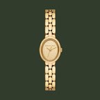 Michael Kors gold-tone oval watch with a matching metal link bracelet, shown against a plain white background.