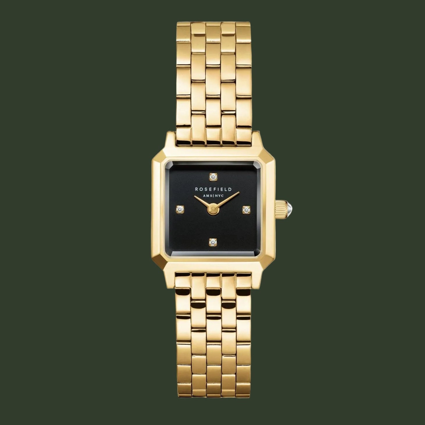 A gold-tone metal watch with a rectangular black dial and a matching gold-tone link bracelet, shown against a plain white background.