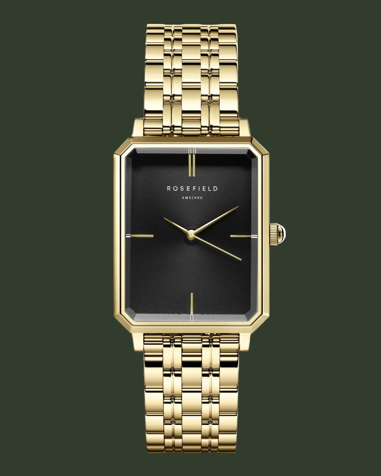 Gold watch with black face on a white background