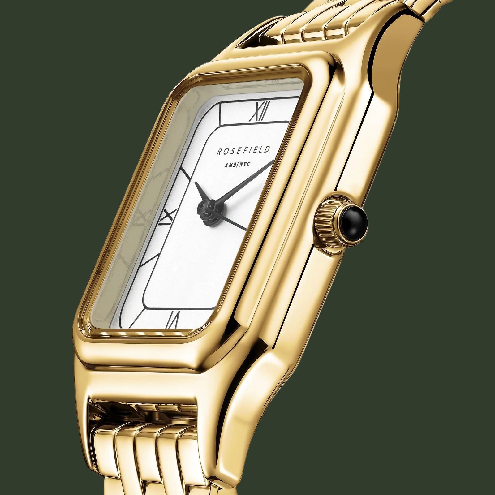Gold wristwatch with a white face and 'Rosefield' branding on a white background