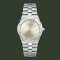 A women's Rosefield watch featuring a silver stainless steel link bracelet, a silver bezel with small crystal accents, and a champagne-gold dial with Roman numeral hour markers.