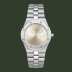 A women's Rosefield watch featuring a silver stainless steel link bracelet, a silver bezel with small crystal accents, and a champagne-gold dial with Roman numeral hour markers.