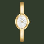 Gold watch with a white face on a white background