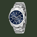 Silver watch with blue dial on a white background