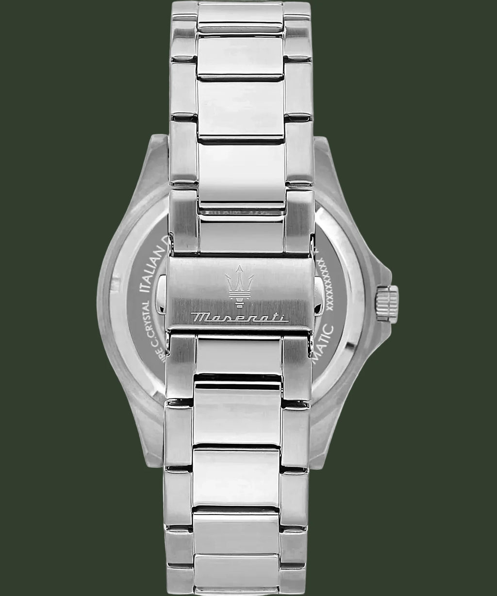 Silver stainless steel watch band with a central clasp engraved with the Maserati trident logo and brand name, shown from the back on a white background.